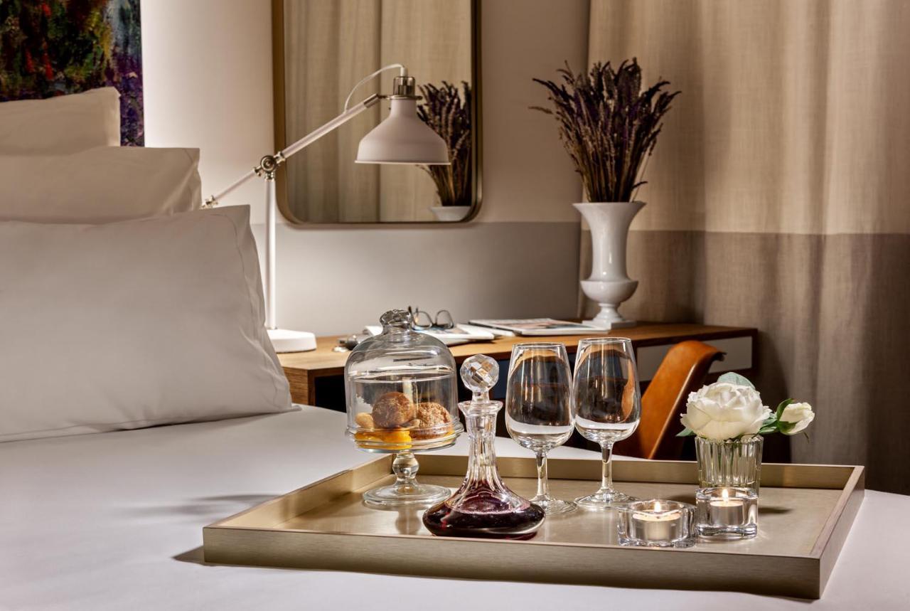 Pestana Douro Riverside - Preferred Hotels & Resorts, Lifestyle Valbom  Экстерьер фото A tray with a decanter, wine glasses, and a candle holder
